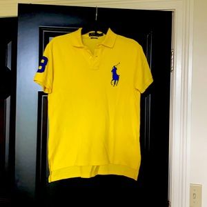 Like new bright yellow with royal polo shirt.